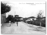 1925 - La via Aurelia. A sx la trattoria 'Portovecchio' di Emilio Faccenda. Gli alberi sono appena piantati. Sullo sfondo la chiesa.