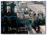 1964 - Polietilene Philips e Acqua Ossigenata visti dal reattore del polietilene ternario in basso con la sala controllo a dx e le colonne di distillazione  settore S a sx. A dx gli essiccatoi del solvente, pi avanti i serbatoi degli alluminioalkili e la riserva dell'esano.