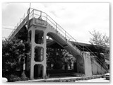 La passerella della stazione RFI risale al 28-10-1935. Alla fine degli anni '90  stata demolita la parte sopra i binari per la costruzione da parte delle FF.SS. del sottopasso.